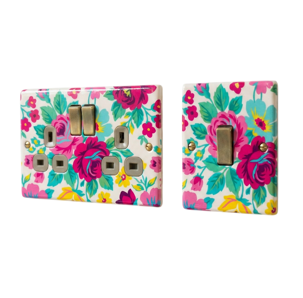 Vibrant pink floral UK socket and switch plates